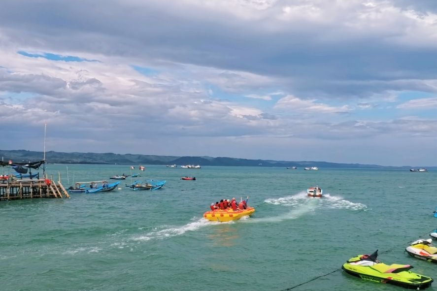banana boat rides on the waters of patong beach
